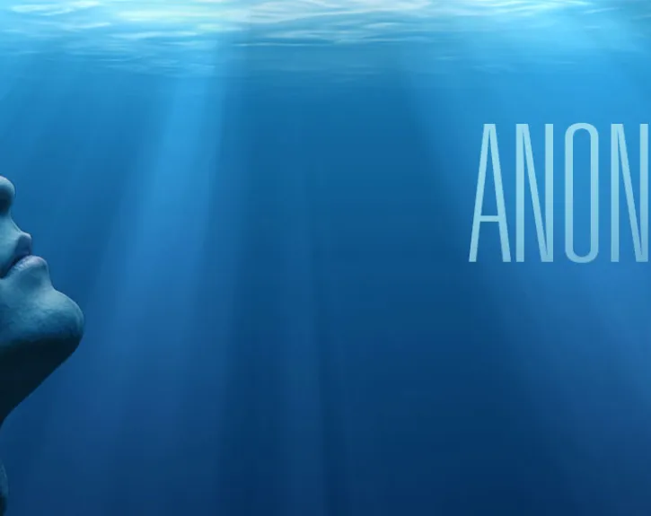 anonymous looking up from under water anonymous title 