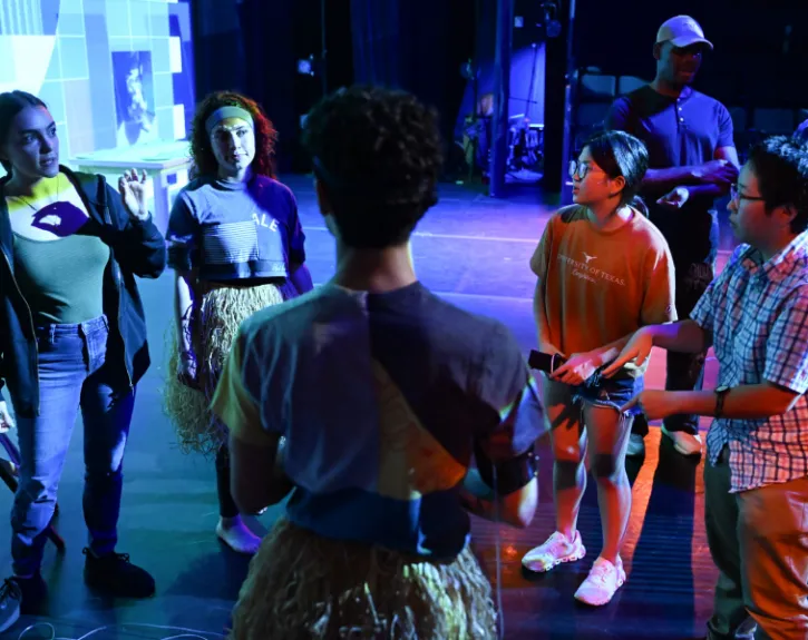 A group of people with sensors attached to their arms