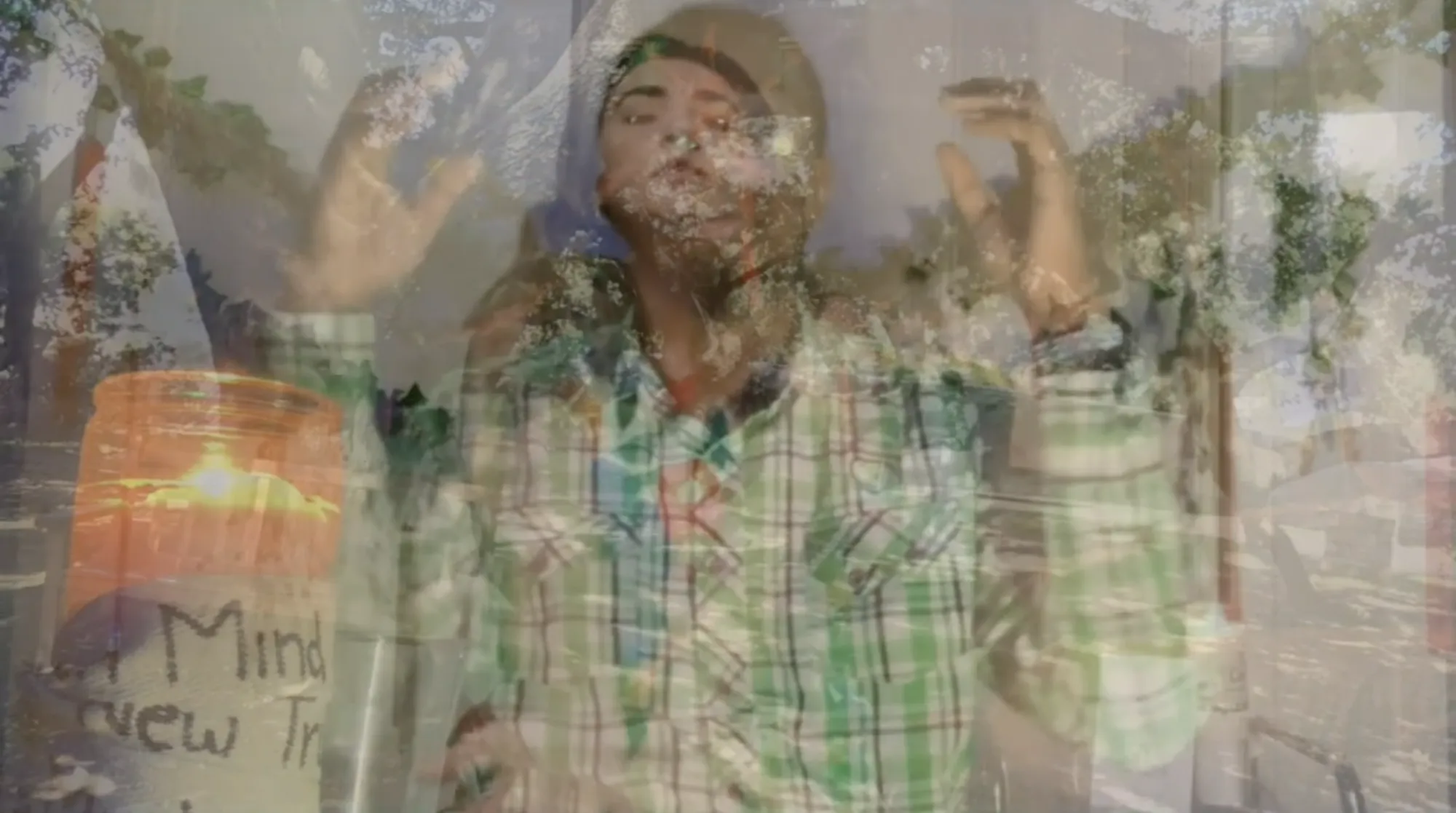 three images layered over each other - two of individual ensemble members performing a ritual in their rooms, and a third of trees