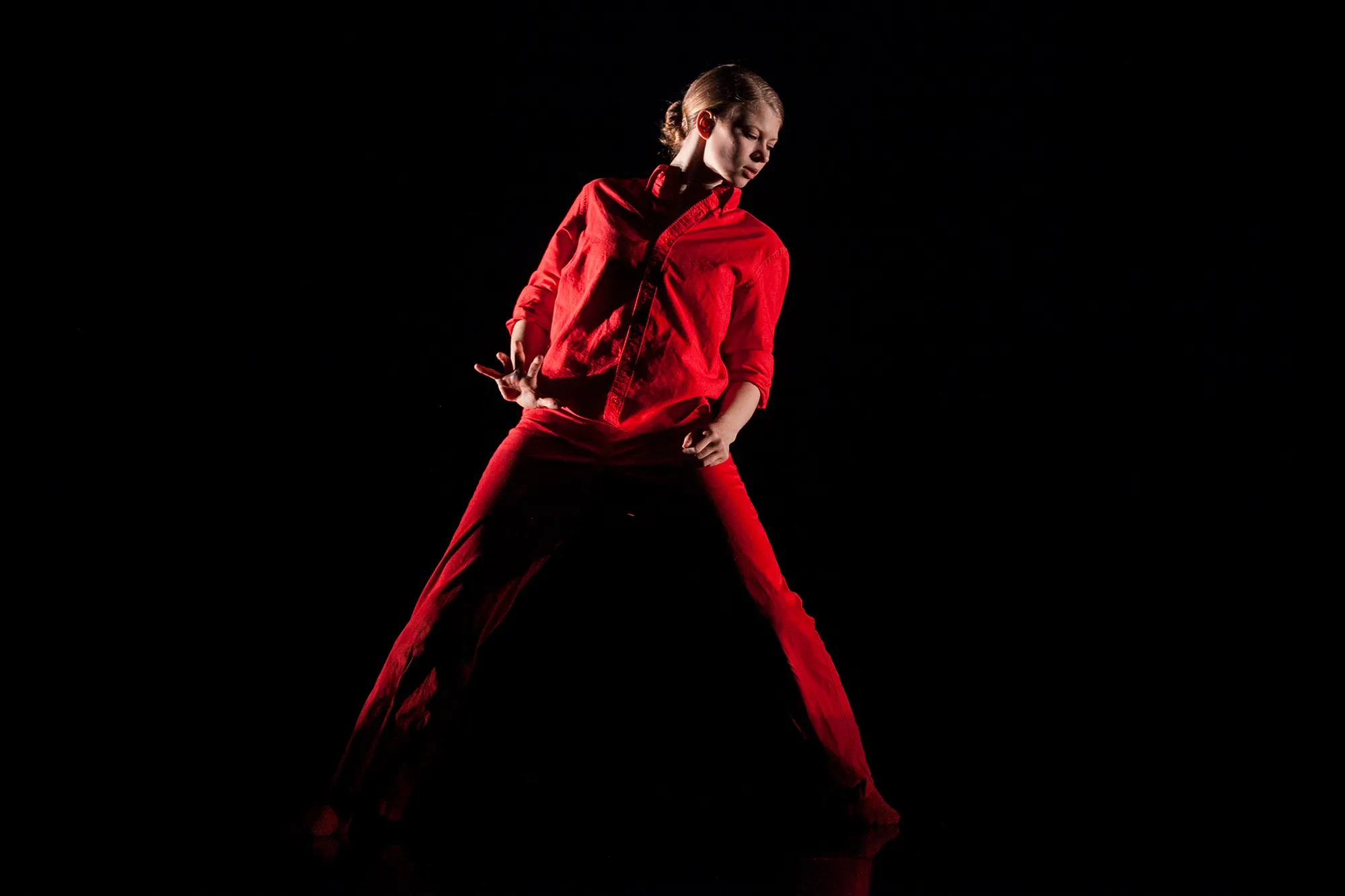 "Maximizing the Audience" by Manuel Vignoulle, performed in "Fall for Dance"; Photo: Lawrence Peart dancer in red leaning to right