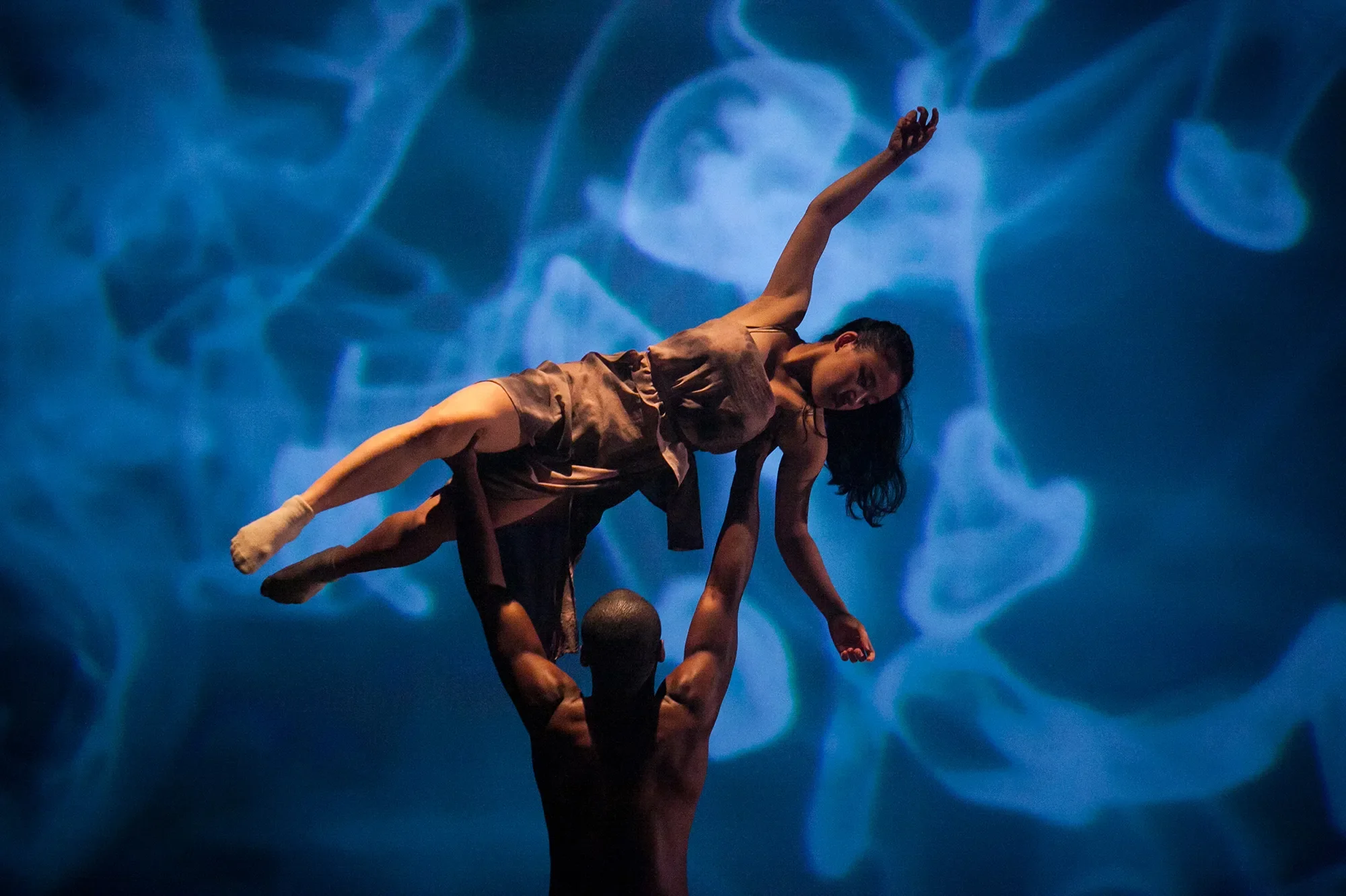 "Fear Knot / Sublime" by David Justin, performed in "Fall for Dance"; Photo: Lawrence Peart man lifitng a woman