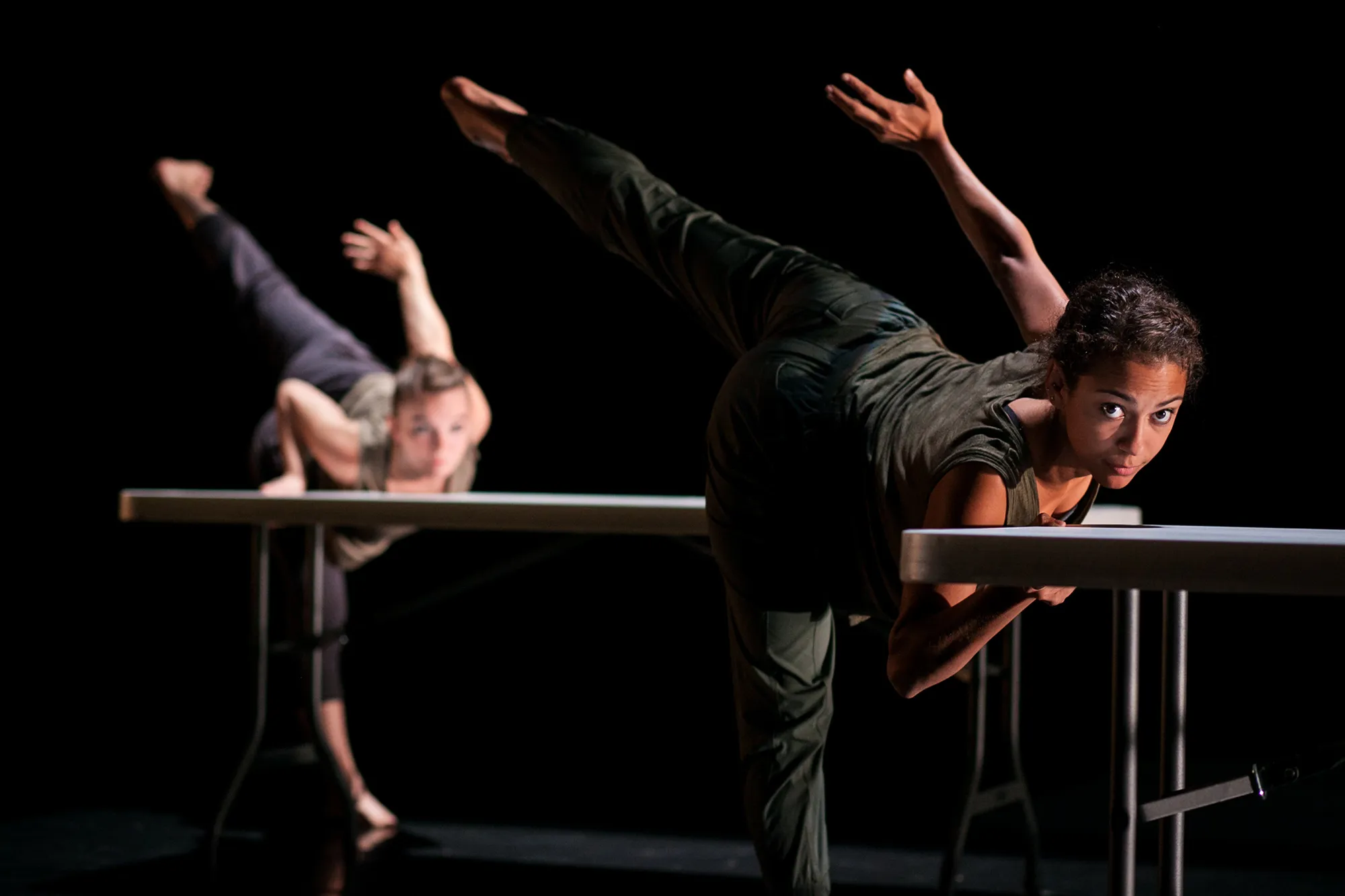 "Poem (Part 1)" by Alex Ketley, performed in "Fall for Dance"; Photo: Lawrence Peart two dancers holding up leg and arm