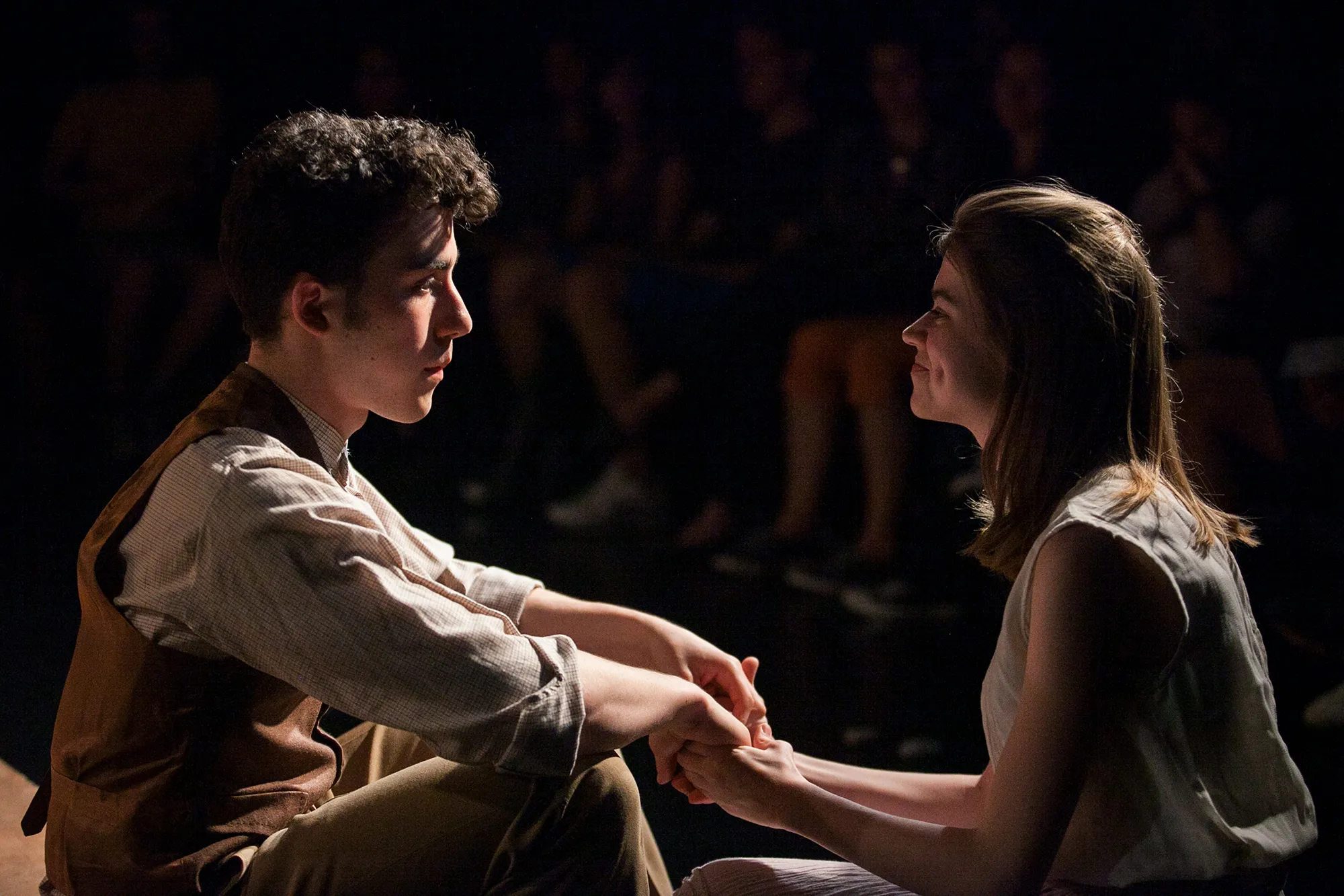 young man and woman looking at each other