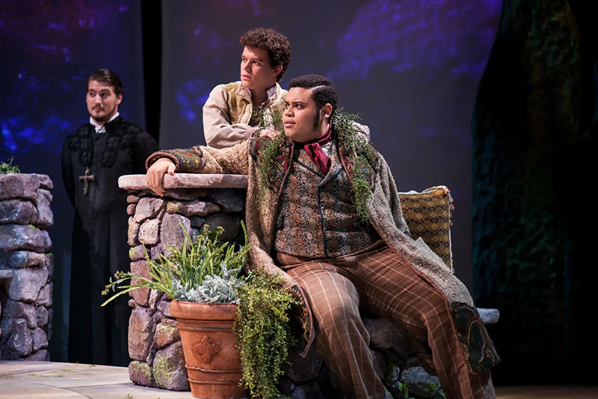 three men looking to their right