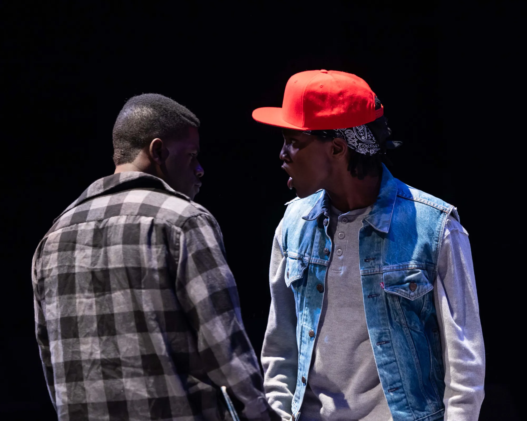 Isaiah, portrayed by Trevor Gatabaki, follows Reggie, played by Khalia Sacko, to his new school. Begging the question, can you ever escape your past, or hide from it long enough to graduate high school?