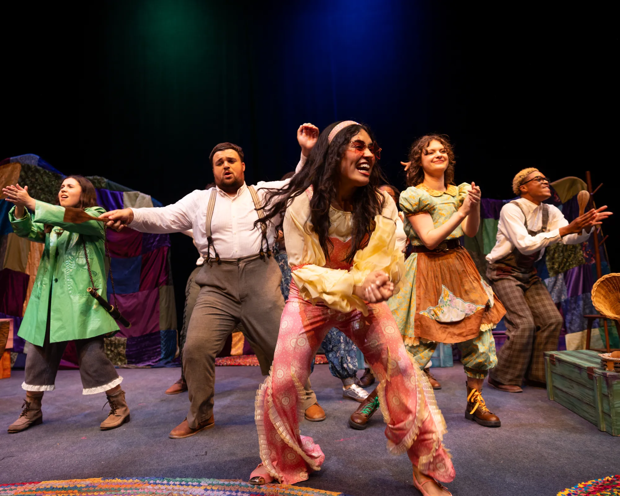 A crowd of people dances