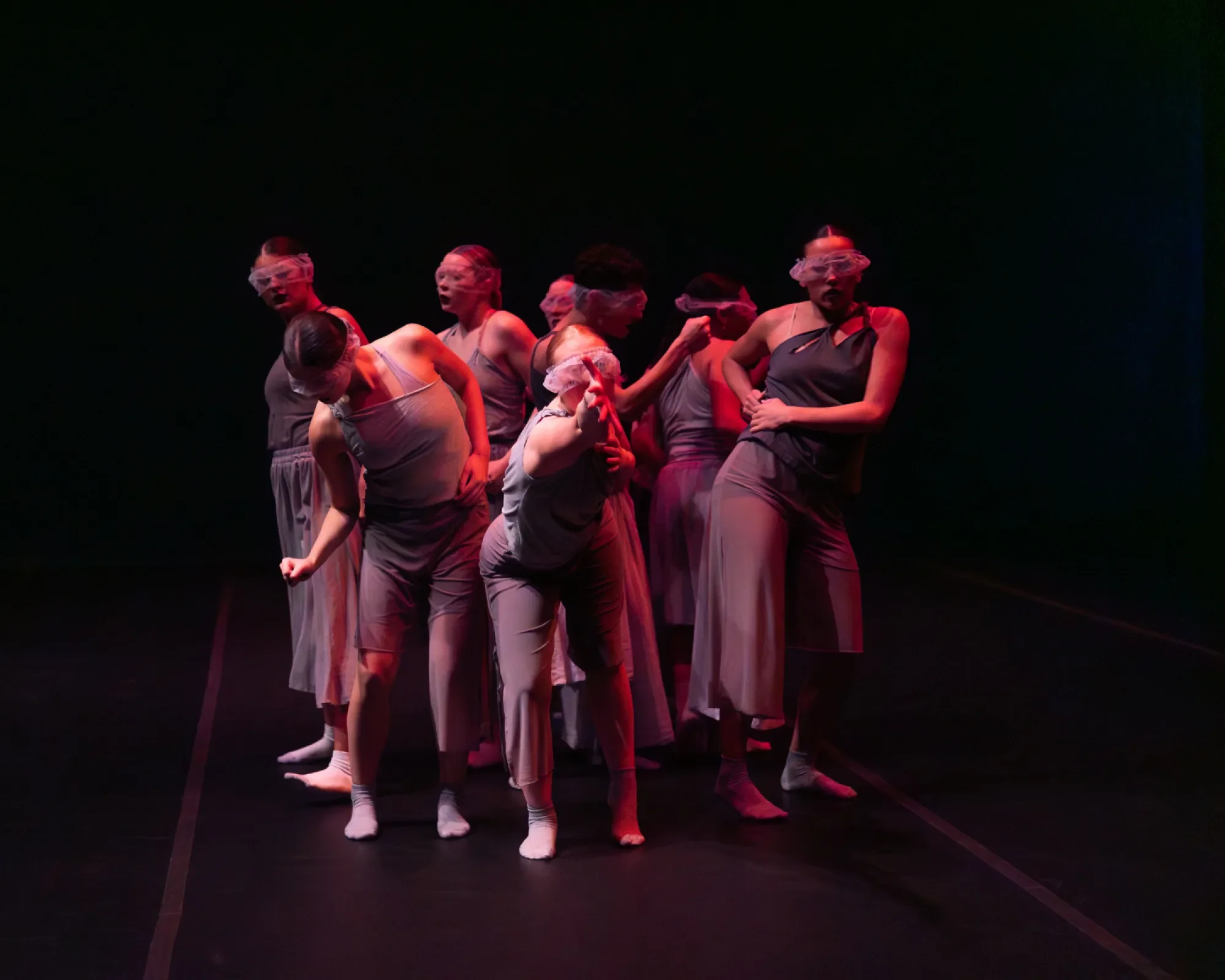 A dancer extends her arms towards the camera