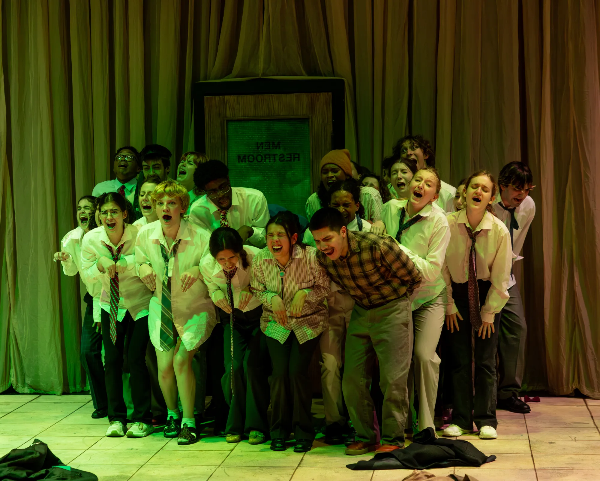 A group of senators crouches and yells