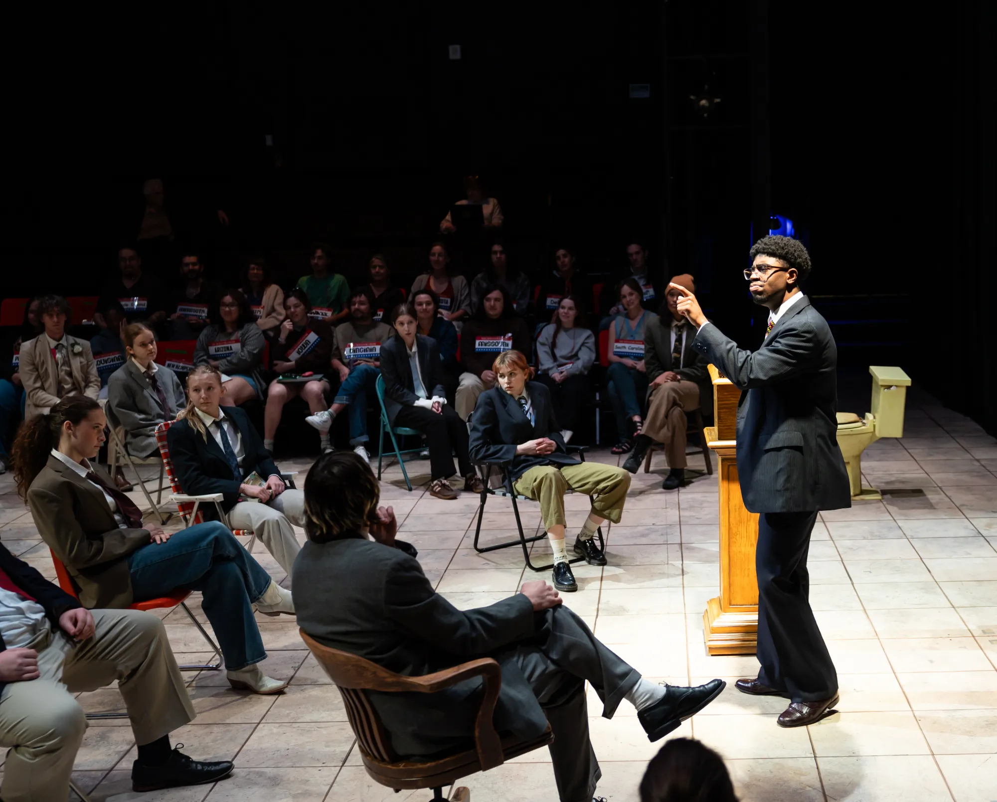 A senator stands and commands the room