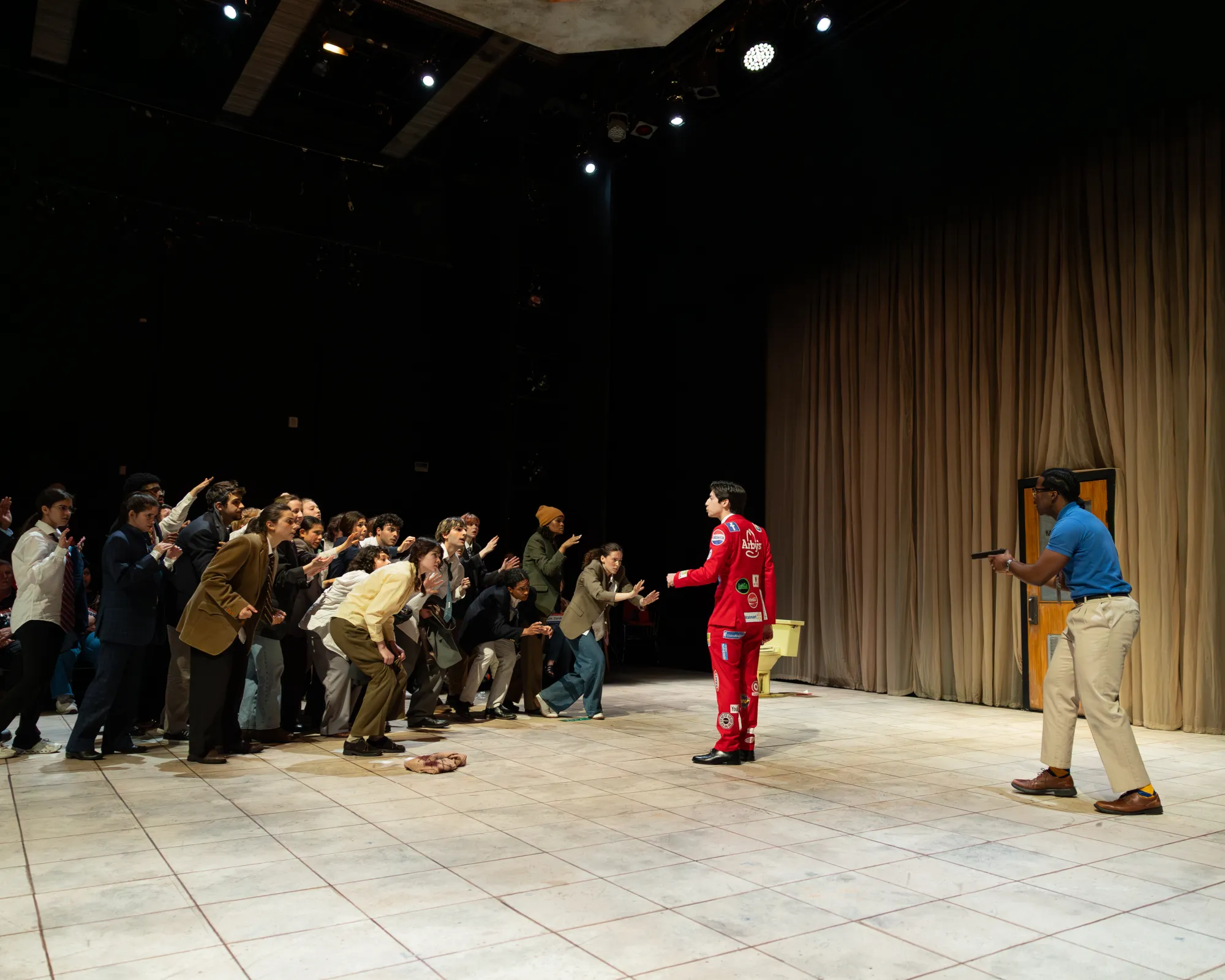 A group of senators stands in fear of a gun