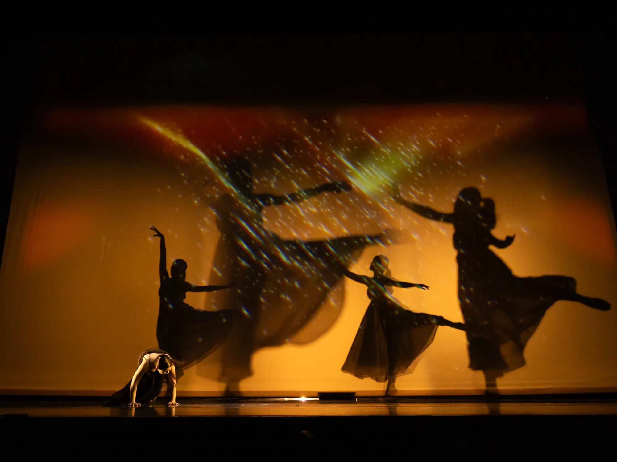 Three shadows of dancers en pointe