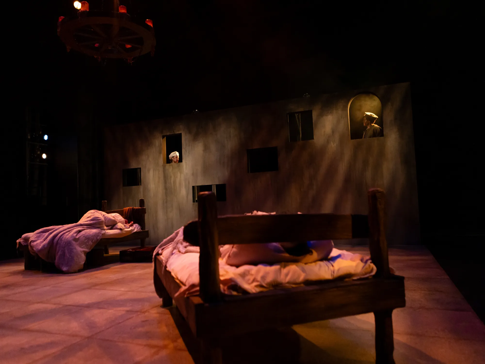 Two beds in a dimly lit room