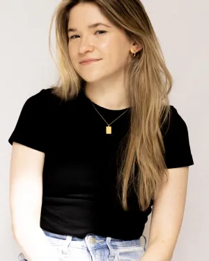 Woman in black shirt smiling