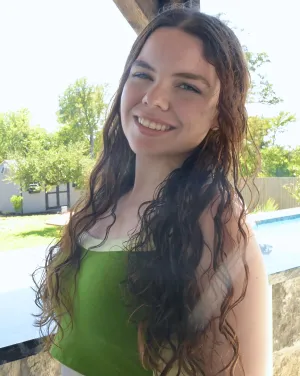 Woman with curly brown hair