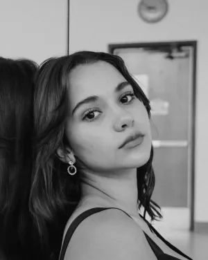 Woman looking at camera in black and white filter