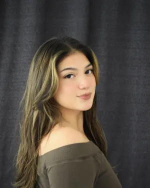  woman turns her head toward the camera