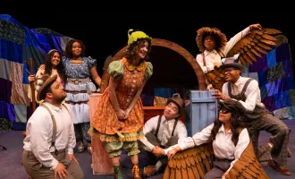 A cast of actors wearing forest animal costumes perform a scene from THIS GIRL LAUGHS, THIS GIRL CRIES, THIS GIRL DOES NOTHING