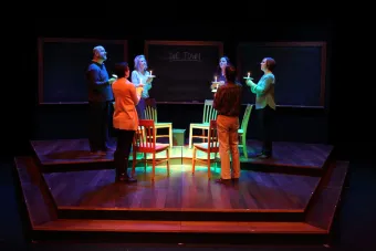 people in circle with candles
