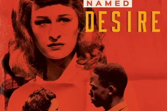 A woman watches a couple dance