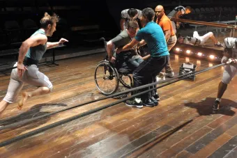 colossal play with football players running