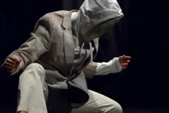 person crouching on ground