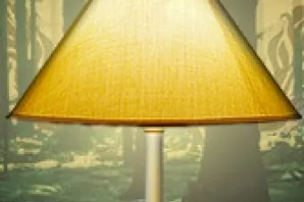 A yellow lamp with a green forest background