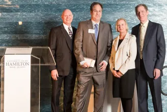 Hamilton Book Award Winners standing in front of wall at the Blanton Museum 