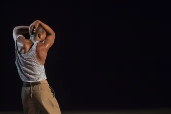 man with tank top from back 