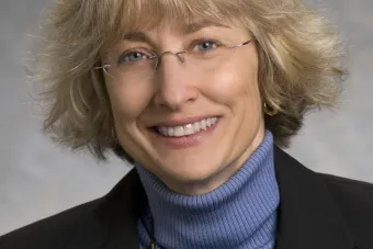 woman in blue sweater