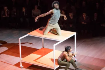 man on table dancing