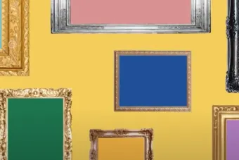 colorful and intricate picture frames that hang on a yellow wall