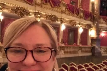 Charlotte Canning in an elegant theatre