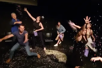 six dancers, all of which are students or faculty and former faculty, throw confetti at the PPP@20 celebration