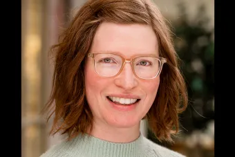 Headshot for Dr. Rachel Merrill Moss, researcher, performer and Assistant Professor in Theatre History