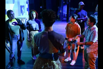 A group of people with sensors attached to their arms