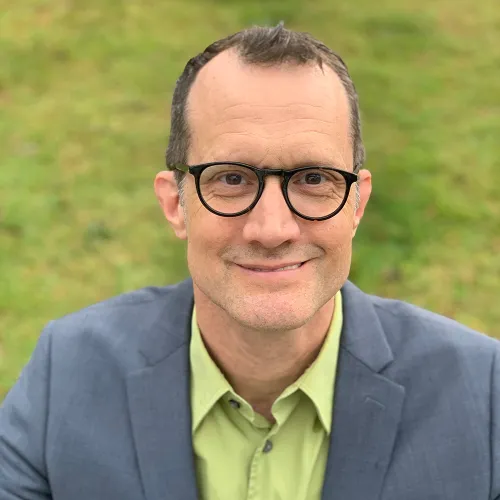Headshot for dance scholar, choreographer, administrator and newly appointed chair of the Department of Theatre and Dance, Peter Carpenter