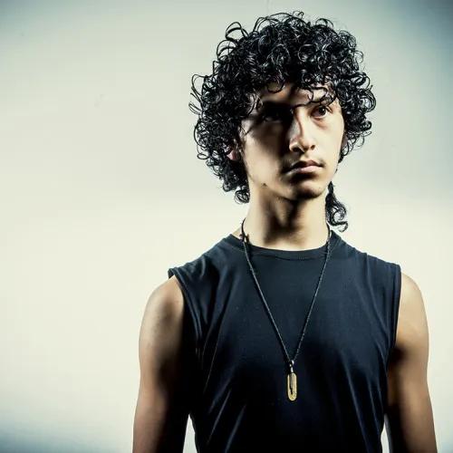 man in black dance clothes
