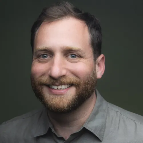 Headshot for actor, director, playwright and teacher Zack Fine