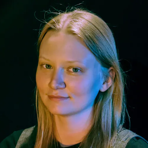 A woman with long blonde hair