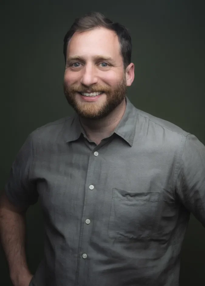 Headshot for actor, director, playwright and teacher Zack Fine