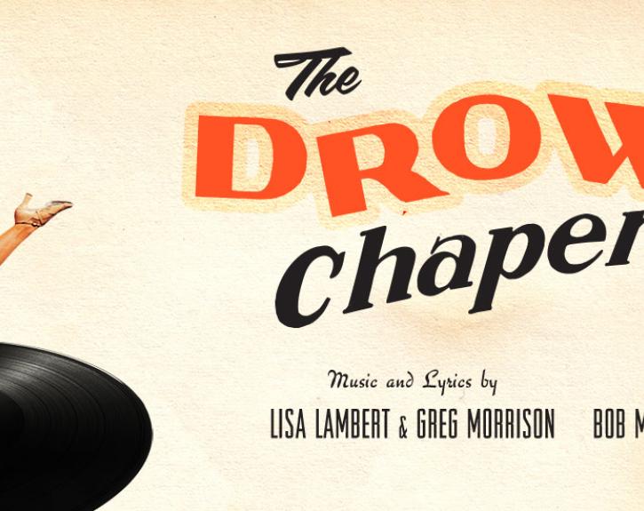 man and a woman dancing on top of a record holding hands the drowsy chaperone