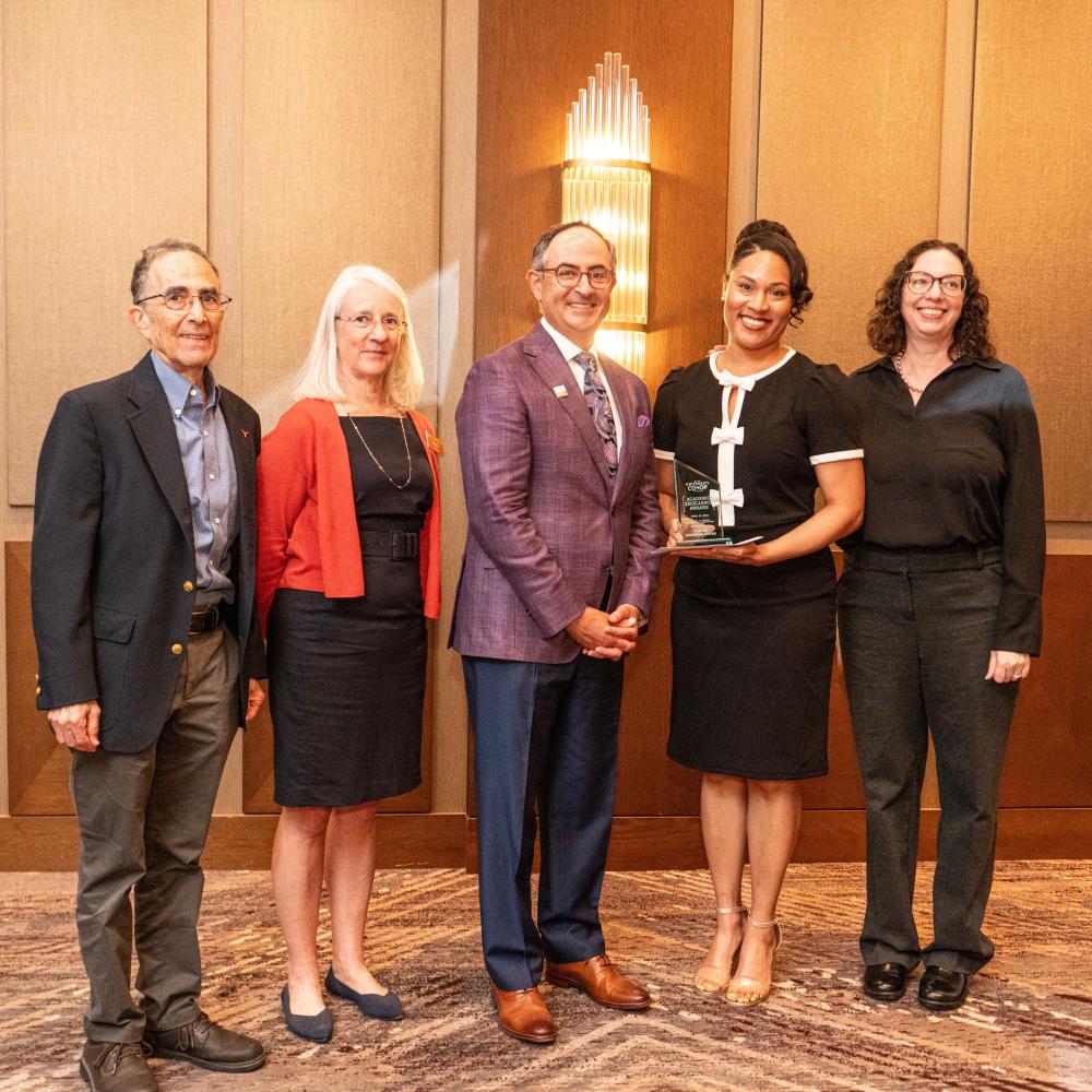 Photo of Yunina Barbour Payne with her award