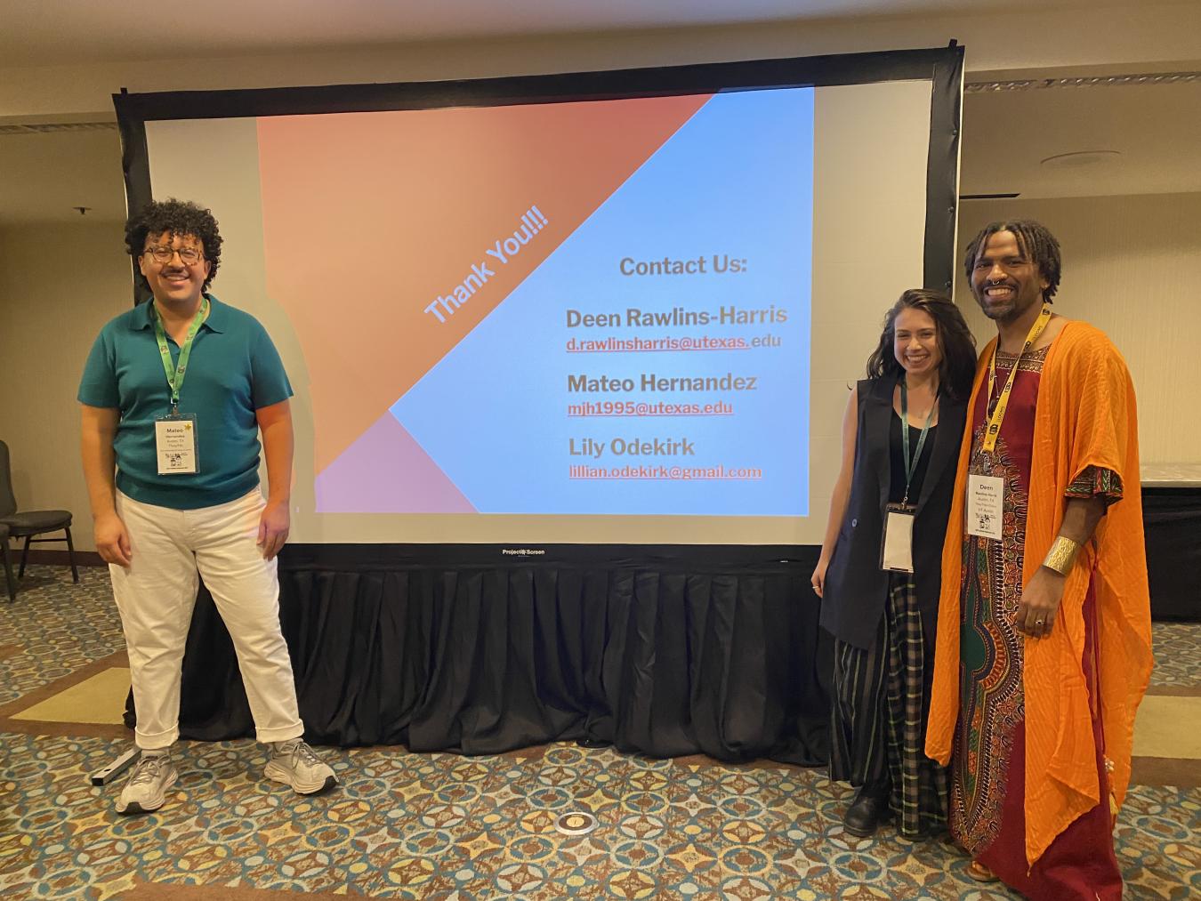 Mateo Hernandez, Lily Odekirk and Deen Rawlins-Harris pose together after their presentation