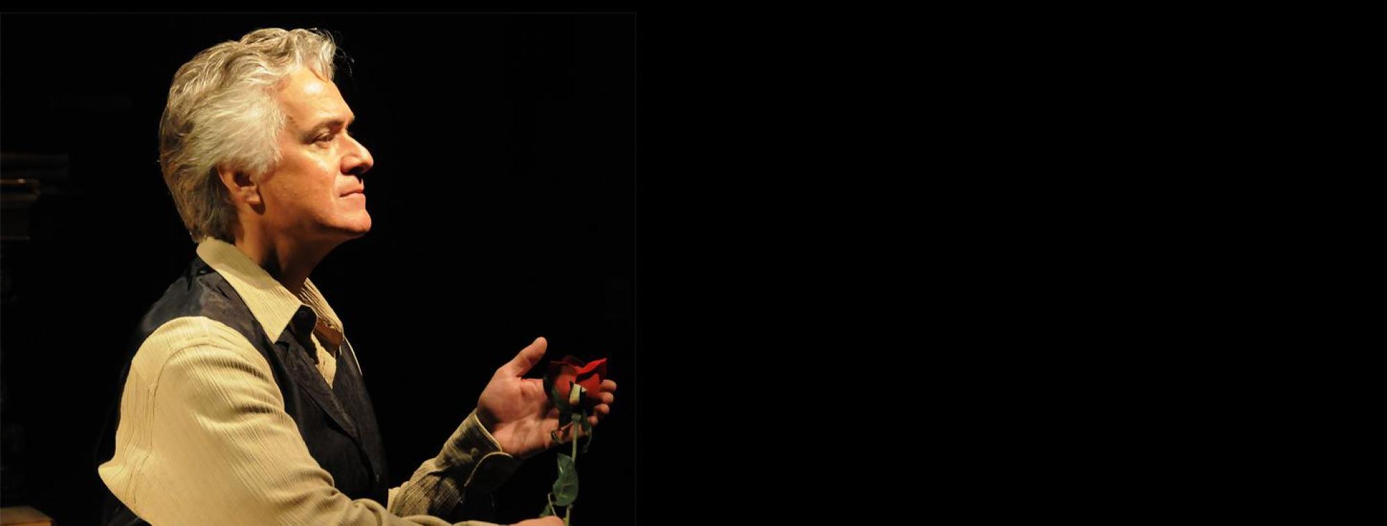 Lucien Douglas in A Shadow Among Strangers: Performing the Life and Works of Edgar Allan Poe Douglas red rose banner