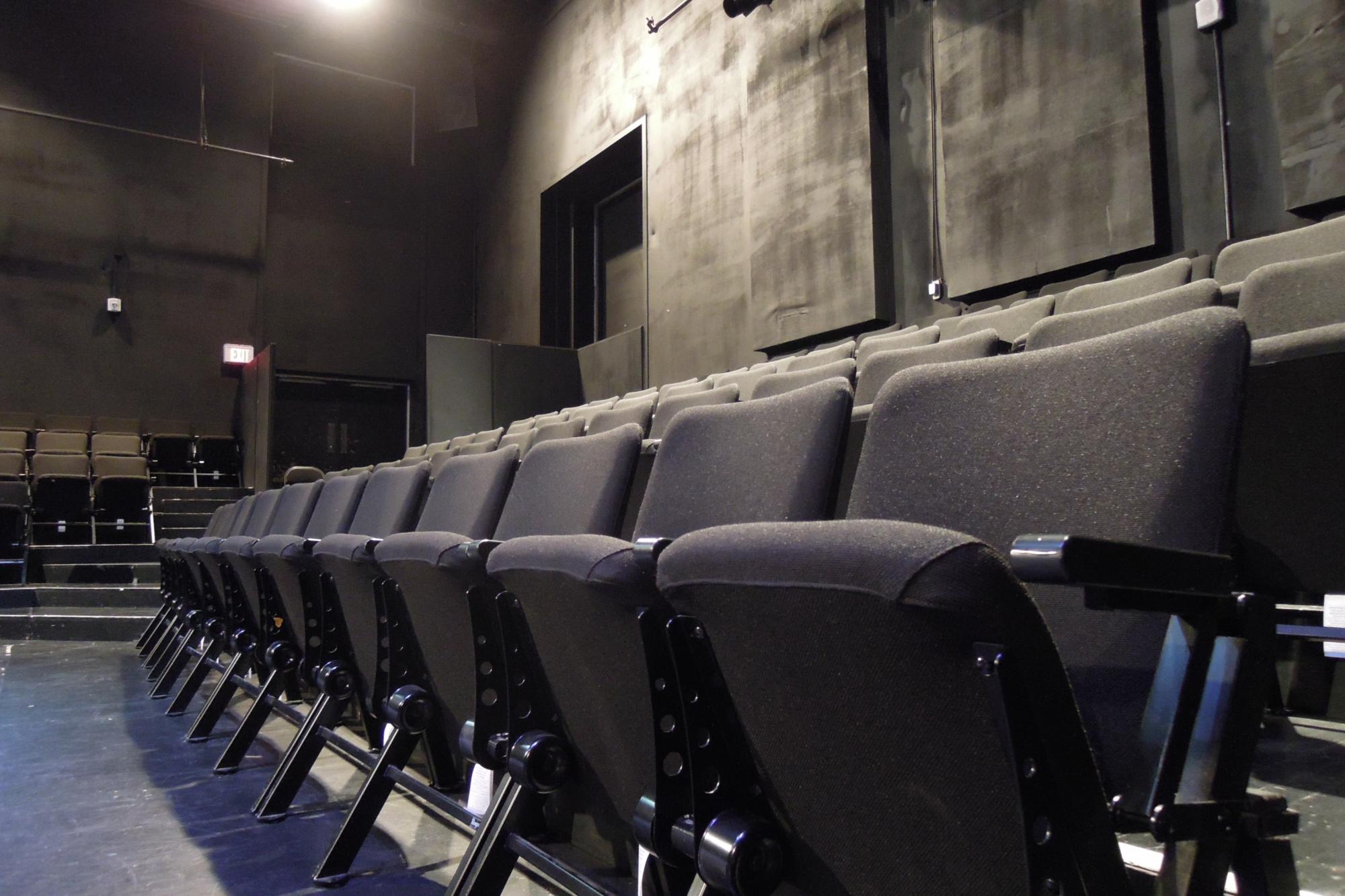 black theatre seats in the Brockett Theatre