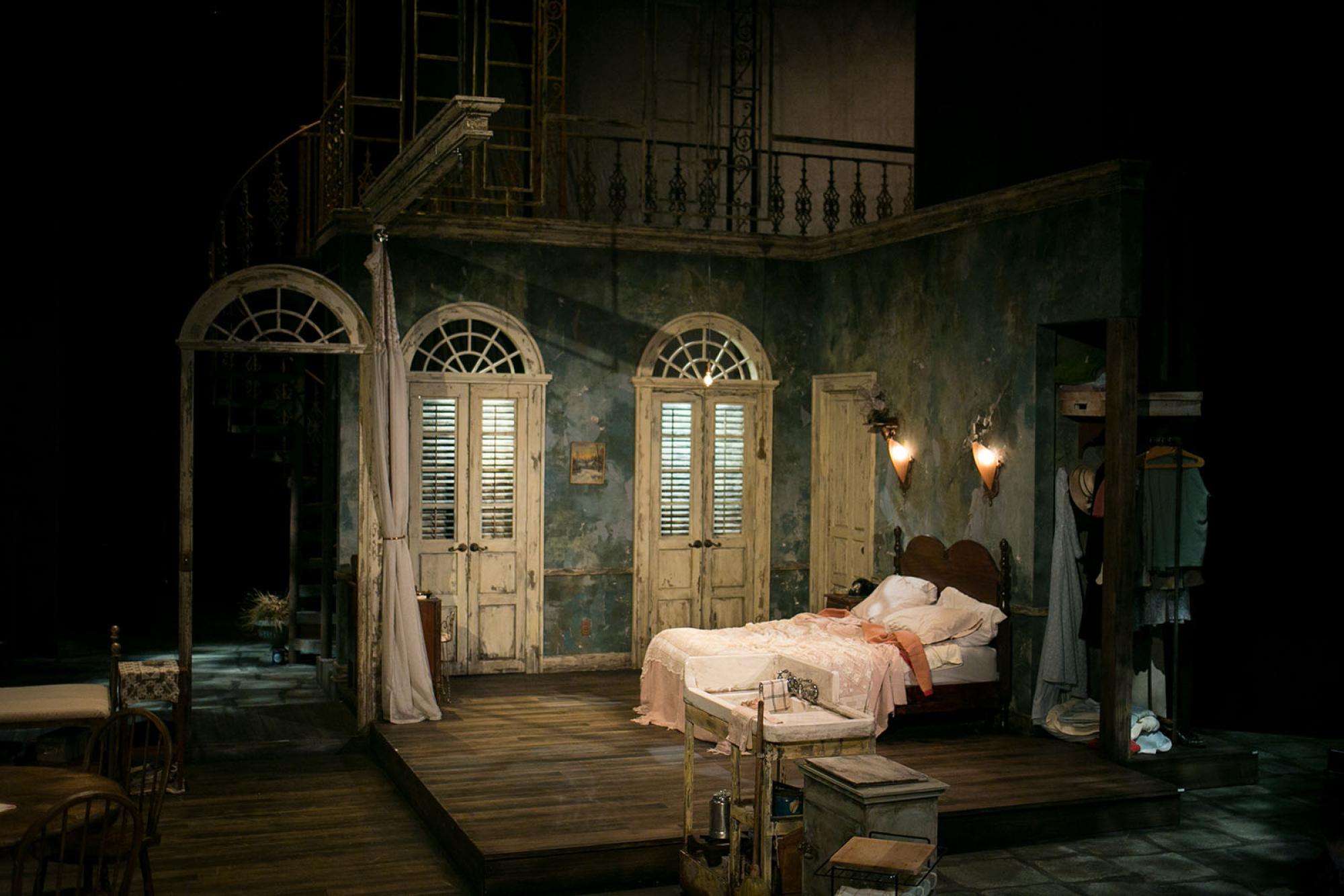 A Streetcar Named Desire production bedroom with green walls