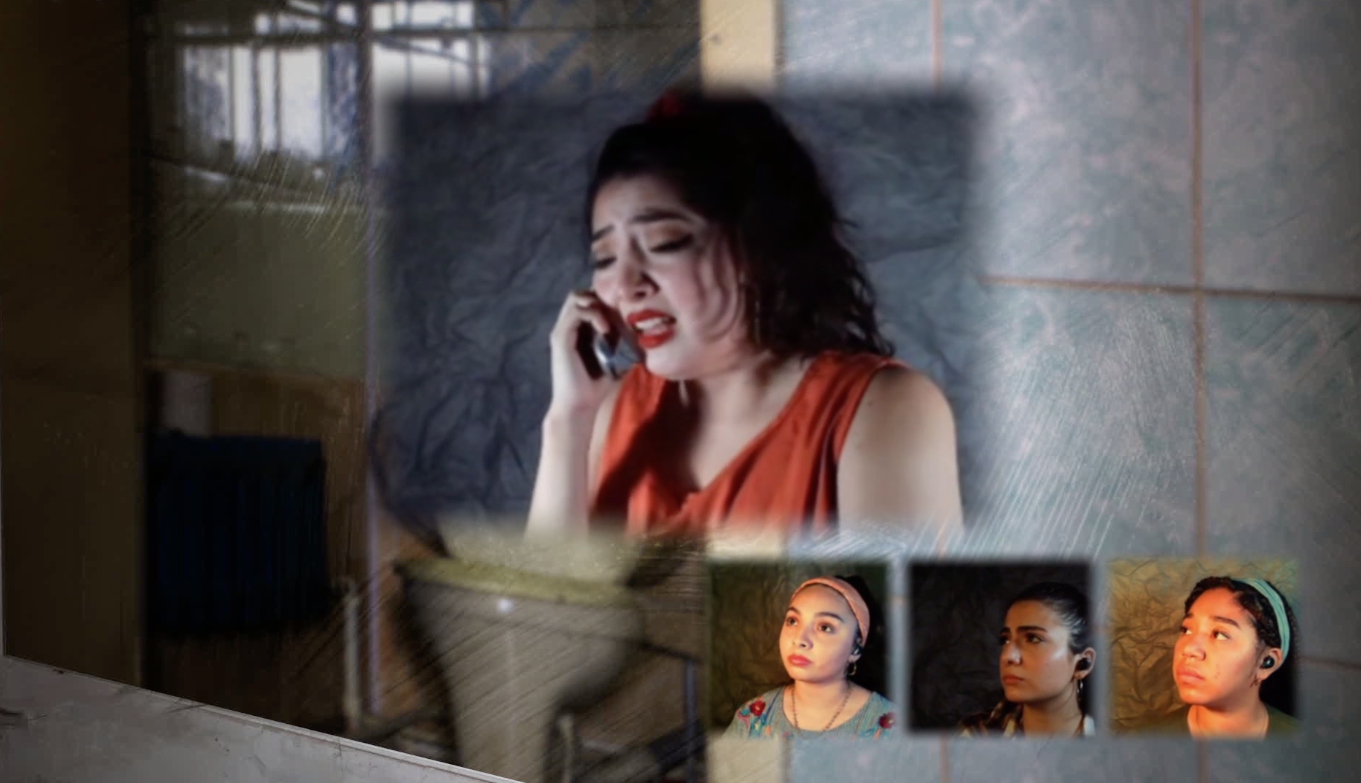 remote actress cries into her phone while three actresses watch with concern