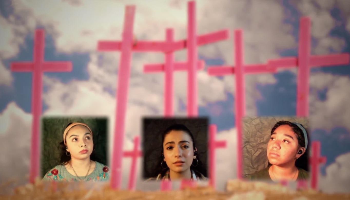 three actresses perform remotely, looking up at the pink crosses behind them