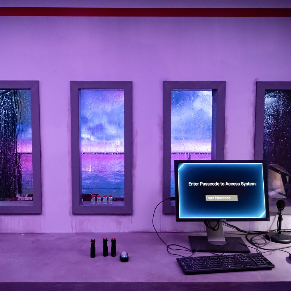 computer screen in front of windows