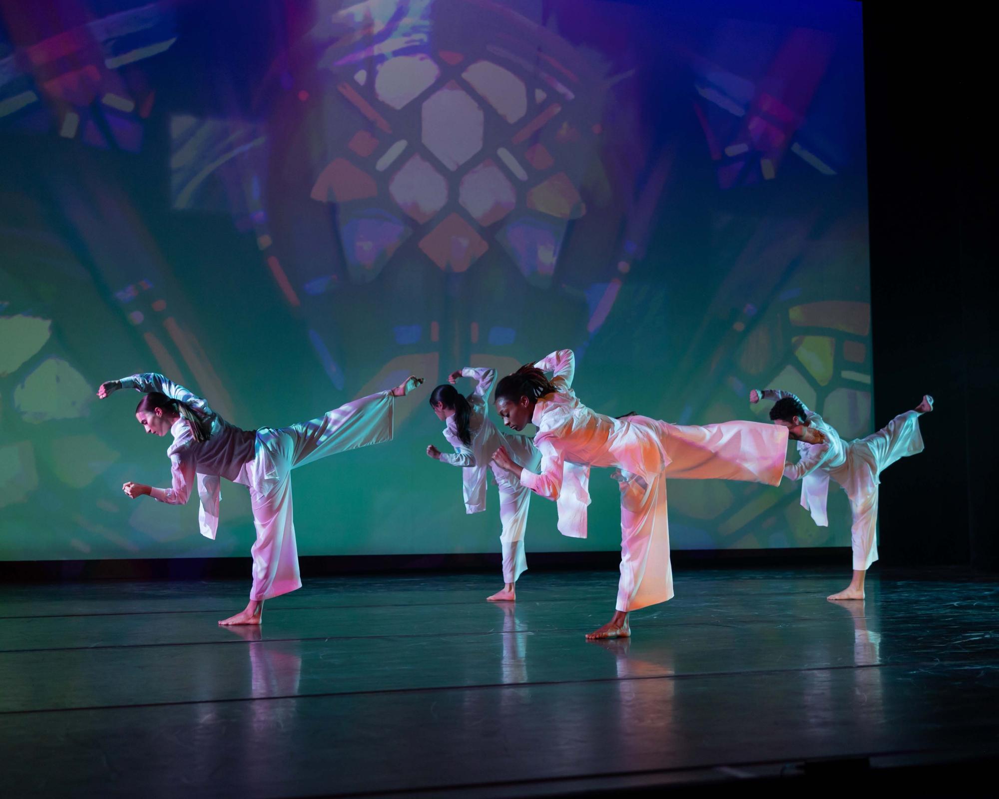 In Agape Love, the dancers all bend at the hip with a leg extended behind them.